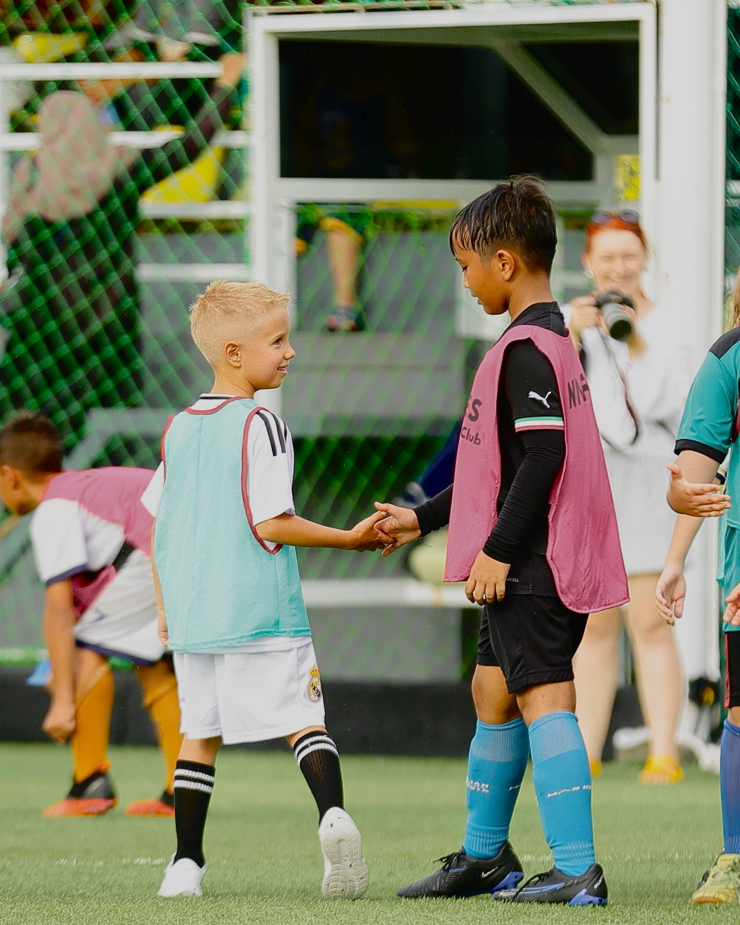 UNITY Football Bali players shaking hands